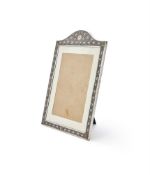 A LARGE SILVER MOUNTED PHOTO FRAME