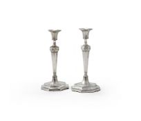 A PAIR OF GEORGE III SILVER CANDLESTICKS