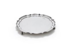 A SILVER SHAPED CIRCULAR SALVER