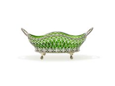 AN EDWARDIAN SILVER TWIN HANDLED PIERCED OVAL BOWL