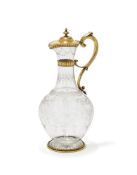A VICTORIAN SILVER GILT MOUNTED GLASS CLARET JUG