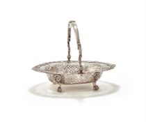 A GEORGE II SILVER SWING HANDLED SHAPED OVAL BASKET