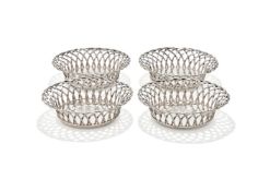 A SET OF FOUR GEORGE III SILVER WIREWORK COASTERS