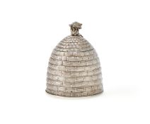 A GEORGE III SILVER BEEHIVE SHAPED HONEY POT
