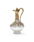 A VICTORIAN SILVER GILT MOUNTED AND GLASS CLARET JUG