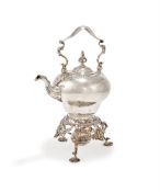 A GEORGE III SILVER KETTLE ON STAND