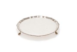 A GEORGE III SILVER SHAPED CIRCULAR SALVER