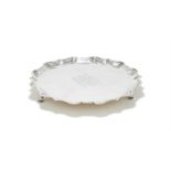 A SILVER SHAPED CIRCULAR SALVER