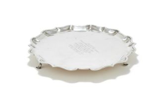 A SILVER SHAPED CIRCULAR SALVER