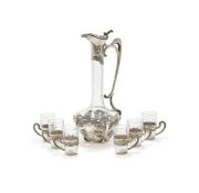 A GERMAN ART NOUVEAU SILVER MOUNTED SEVEN PIECE LIQUOUR SET