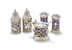 AN EDWARDIAN CASED SILVER THREE PIECE CRUET SET