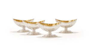 A SET OF FOUR GEORGE III SILVER SHAPED OVAL SALT CELLARS