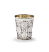 A GERMAN PARCEL GILT SILVER COIN BEAKER