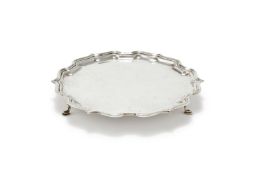 A SILVER SHAPED CIRCULAR WAITER