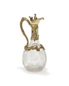 A VICTORIAN SILVER GILT MOUNTED GLASS CLARET JUG