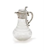 A VICTORIAN SILVER MOUNTED GLASS CLARET JUG