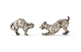 A PAIR OF VICTORIAN SILVER CAT AND DOG PEPPERETTES