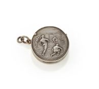 AN EDWARDIAN SILVER CIRCULAR VESTA CASE