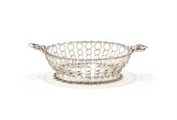 AN EDWARDIAN SILVER PIERCED OVAL BOWL
