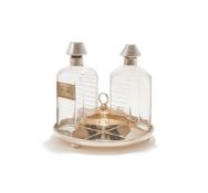 A MATCHED PAIR OF SILVER MOUNTED DECANTERS OR MEDICINE BOTTLES