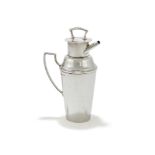 A SILVER COCKTAIL SHAKER