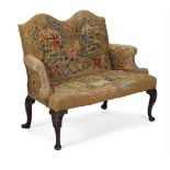 A WALNUT AND NEEDLEWORK UPHOLSTERED SETTEE, IN GEORGE II STYLE, LATE 19TH CENTURY