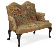 A WALNUT AND NEEDLEWORK UPHOLSTERED SETTEE, IN GEORGE II STYLE, LATE 19TH CENTURY