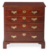 A GEORGE II MAHOGANY CHEST OF DRAWERS, CIRCA 1750