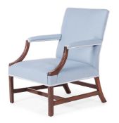 A GEORGE III MAHOGANY AND FRET CARVED GAINSBOROUGH ARMCHAIR, CIRCA 1790