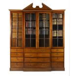 A GEORGE III MAHOGANY BREAKFRONT LIBRARY BOOKCASE, CIRCA 1780