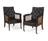 A PAIR OF MAHOGANY BERGERE LIBRARY ARMCHAIRS, IN REGENCY STYLE, EARLY 20TH CENTURY