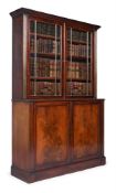 A GEORGE IV MAHOGANY AND GILT BRASS MOUNTED LIBRARY BOOKCASE, CIRCA 1825
