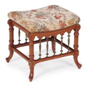 AN AESTHETIC MOVEMENT SOLID SATINWOOD, BRASS MOUNTED AND PARCEL GILT STOOL, LATE 19TH CENTURY