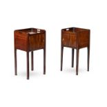 A CLOSELY MATCHED PAIR OF GEORGE III MAHOGANY BEDSIDE CUPBOARDS, CIRCA 1800