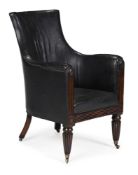 A REGENCY MAHOGANY AND STUDDED LEATHER UPHOLSTERED LIBRARY ARMCHAIR, CIRCA 1820