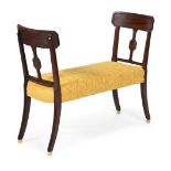 A MAHOGANY AND UPHOLSTERED DRESSING STOOL OR WINDOW SEAT, INCORPORATING 19TH CENTURY ELEMENTS