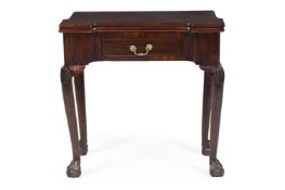 A GEORGE II MAHOGANY FOLDING CARD TABLE, POSSIBLY IRISH, CIRCA 1750
