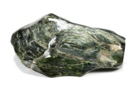 A POLISHED NEPHRITE JADE BOULDER
