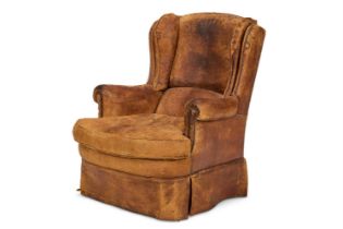 A CLOSE NAILED LEATHER WING ARMCHAIR, MID 20TH CENTURY