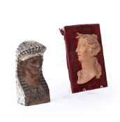 A CARVED AND POLYCHROME FURNITURE MOUNT AS AN EGYPTIAN HEAD, TOGETHER WITH A PROFILE RELIEF OF CERES