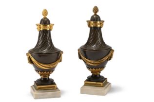 A PAIR OF FRENCH GILT AND PATINATED BRONZE MANTEL URNS, EARLY OR MID 19TH CENTURY