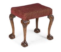 A MAHOGANY AND UPHOLSTERED STOOL IN GEORGE II STYLE, CIRCA 1900