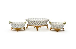 A SET OF THREE PORCELAIN TABLE BASKETS