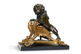 A GILT AND PATINATED ANIMALIER BRONZE, IN THE MANNER OF A RÉGENCE CHENET, 19TH CENTURY