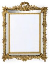 A CARVED GILTWOOD WALL MIRROR, FRENCH, LATE 19TH CENTURY
