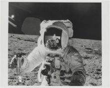 [Apollo 12] PORTRAIT OF ALAN BEAN WITH THE PHOTOGRAPHER’S REFLECTION IN HIS VISOR