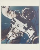 [Gemini IV] FIRST U.S. SPACE WALK: SPACECRAFT REFLECTS IN ED WHITE’S GOLDEN VISOR
