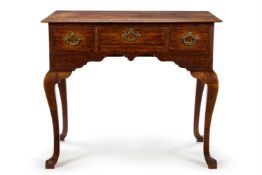A GEORGE II OAK LOWBOY, MID 18TH CENTURY