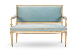 A LOUIS XVI STYLE WHITE PAINTED AND PARCEL GILT CANAPE, 19TH CENTURY