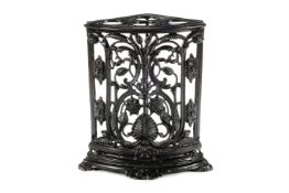 A VICTORIAN BLACK PAINTED CAST IRON CORNER STICK STAND, LATE 19TH CENTURY